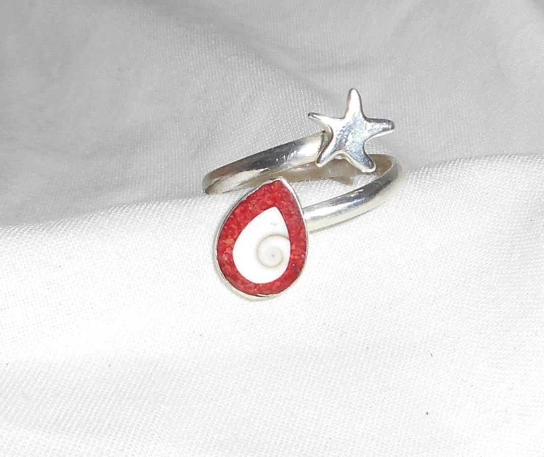 Anillo original de plata 925 con estrella de mar y ojo de Santa Lucía