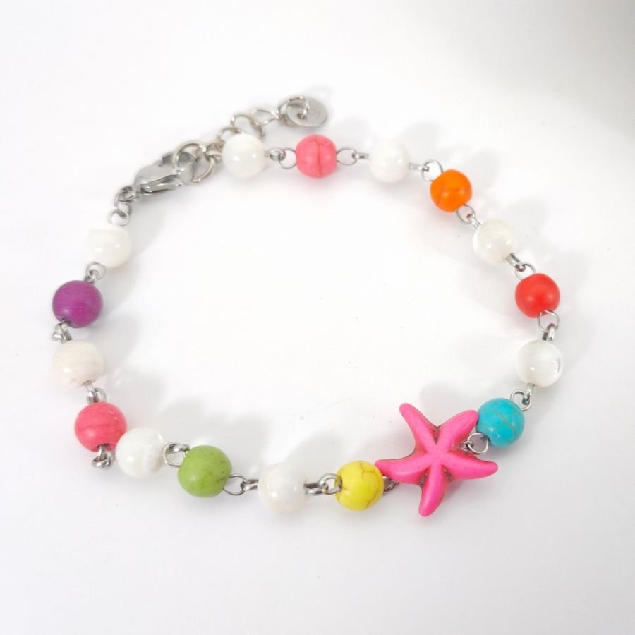 Pulsera de piedras multicolores con estrella de mar rosa