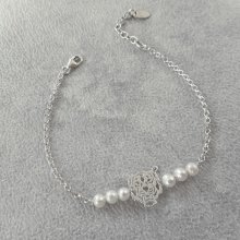 Pulsera de perlas cultivadas y tigre en cadena de plata 925