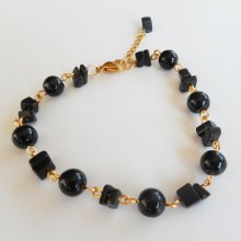 Pulsera de piedra ónice y acero chapado en oro