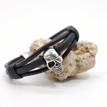 Pulsera de calavera y tibias cruzadas con cordones de cuero negro